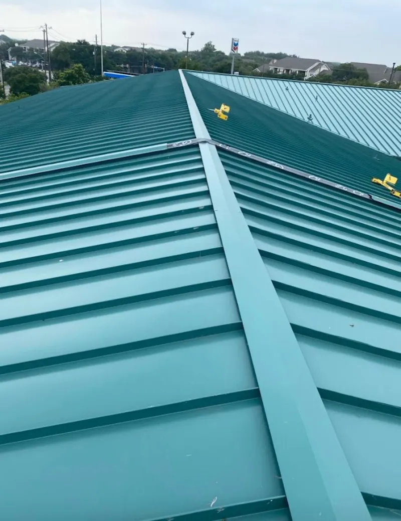 Green commercial metal roof ridge and valley for Metal Roof Repair in Edinburg