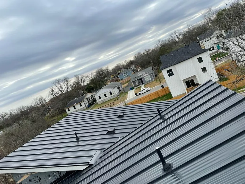 Standing seam metal roof panels with vents for Skylight Repair in Edinburg